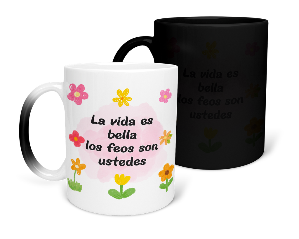Taza Mágica 11 Oz MAM1 FPS3. Frase "La vida es bella los feos son ustedes"